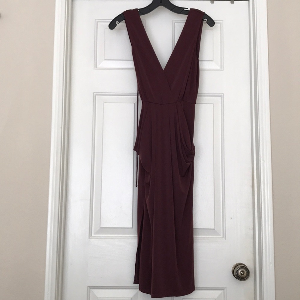 Sleeveless midi dress with pockets